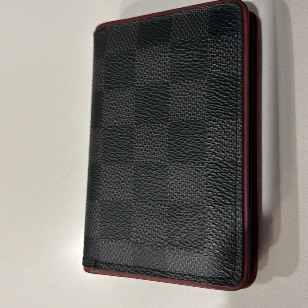 Louis Vuitton black wallet.